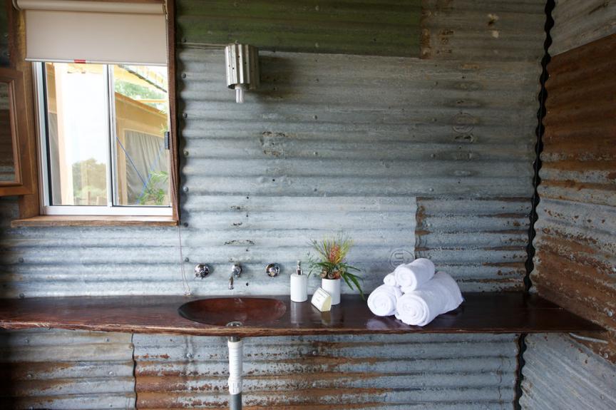 5102 Zoo News Shoot March 29 2017Slumber Safari huts Werribee Open Range Zoo Bathroom in Slumber Safari huts. Interior photo showing towels and other bathroom accessories. ZooNews WORZ 64